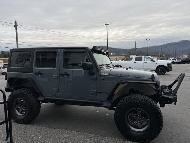 used 2015 Jeep Wrangler Unlimited car, priced at $21,900