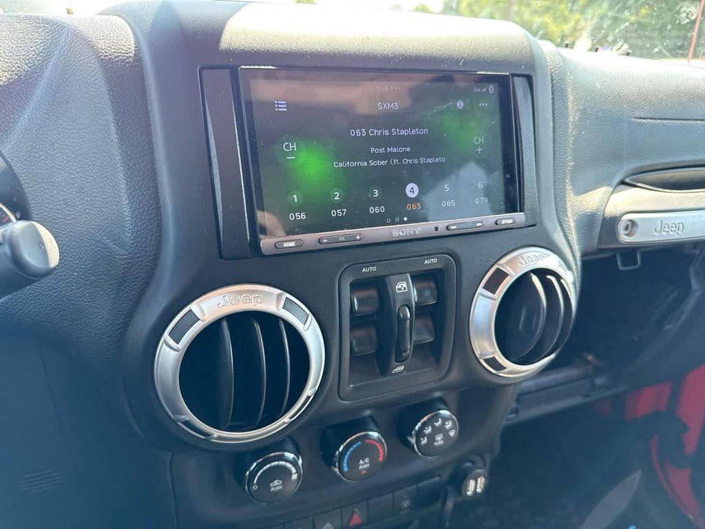 used 2013 Jeep Wrangler Unlimited car, priced at $15,798
