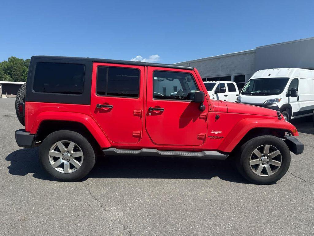 used 2013 Jeep Wrangler Unlimited car, priced at $15,798
