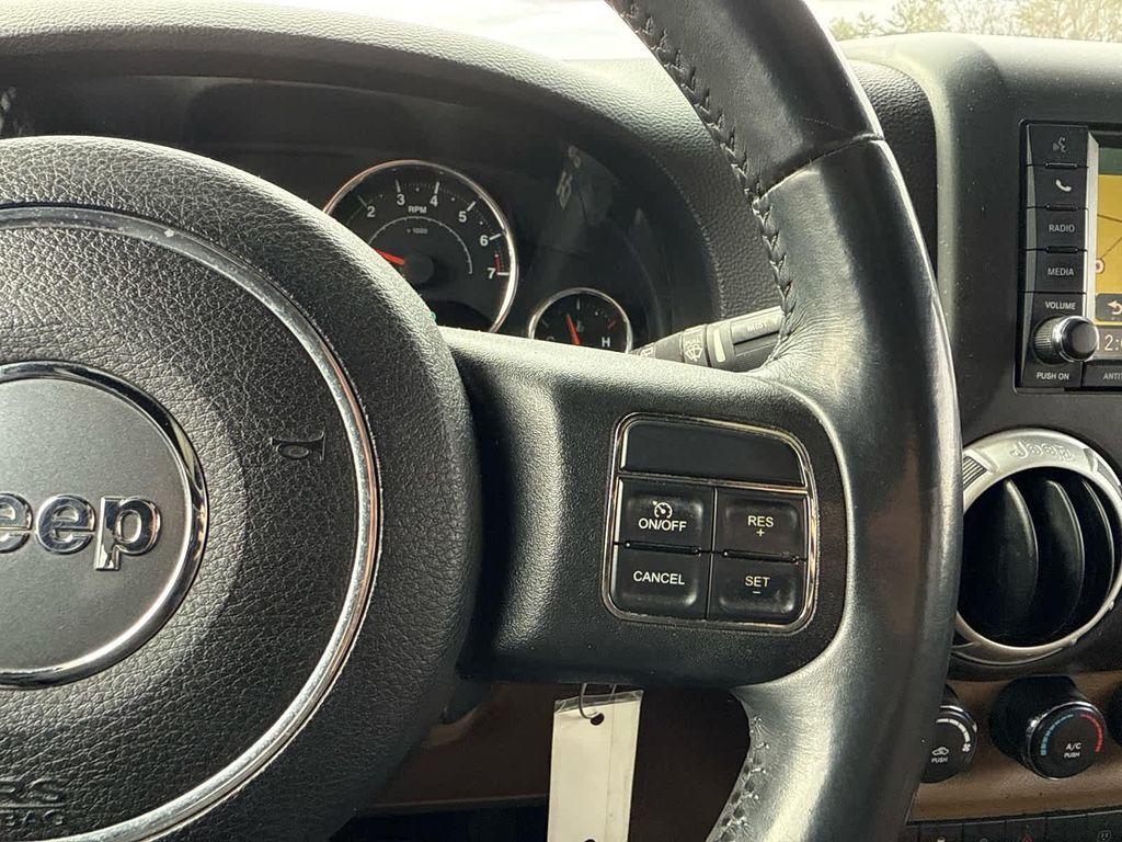 used 2014 Jeep Wrangler Unlimited car, priced at $15,797