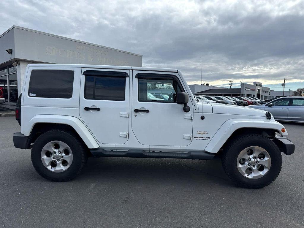 used 2014 Jeep Wrangler Unlimited car, priced at $15,797