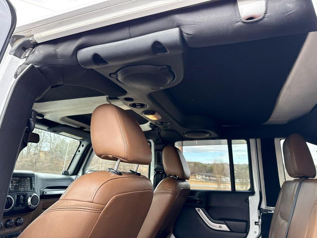 used 2014 Jeep Wrangler Unlimited car, priced at $15,797