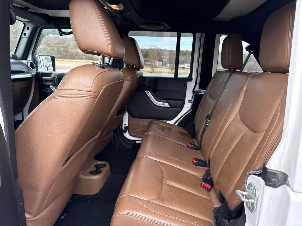 used 2014 Jeep Wrangler Unlimited car, priced at $15,797