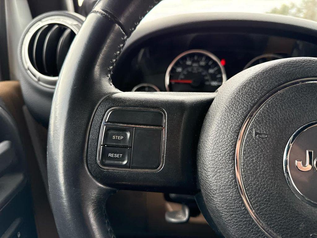 used 2014 Jeep Wrangler Unlimited car, priced at $15,797