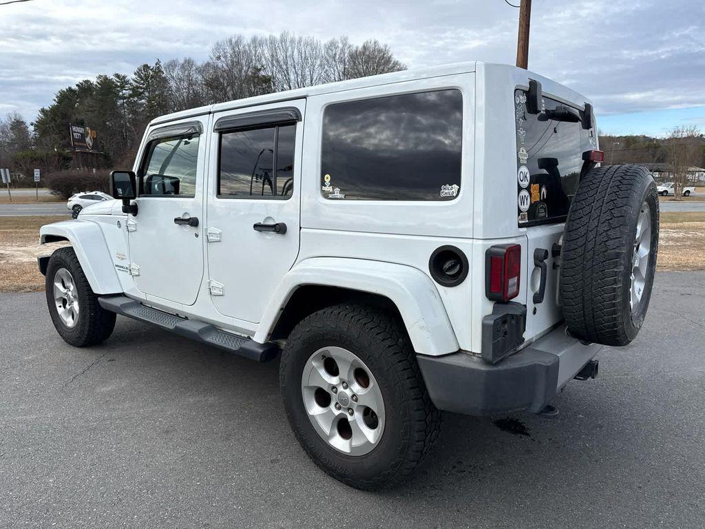 used 2014 Jeep Wrangler Unlimited car, priced at $15,797