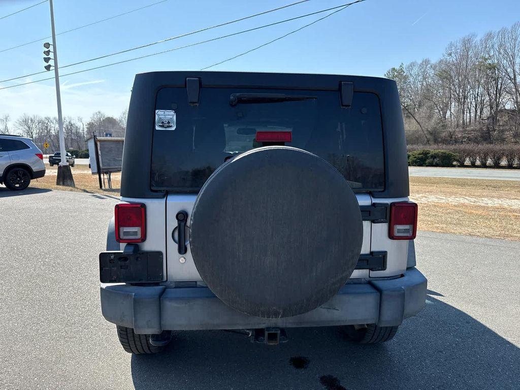 used 2018 Jeep Wrangler JK Unlimited car, priced at $19,699