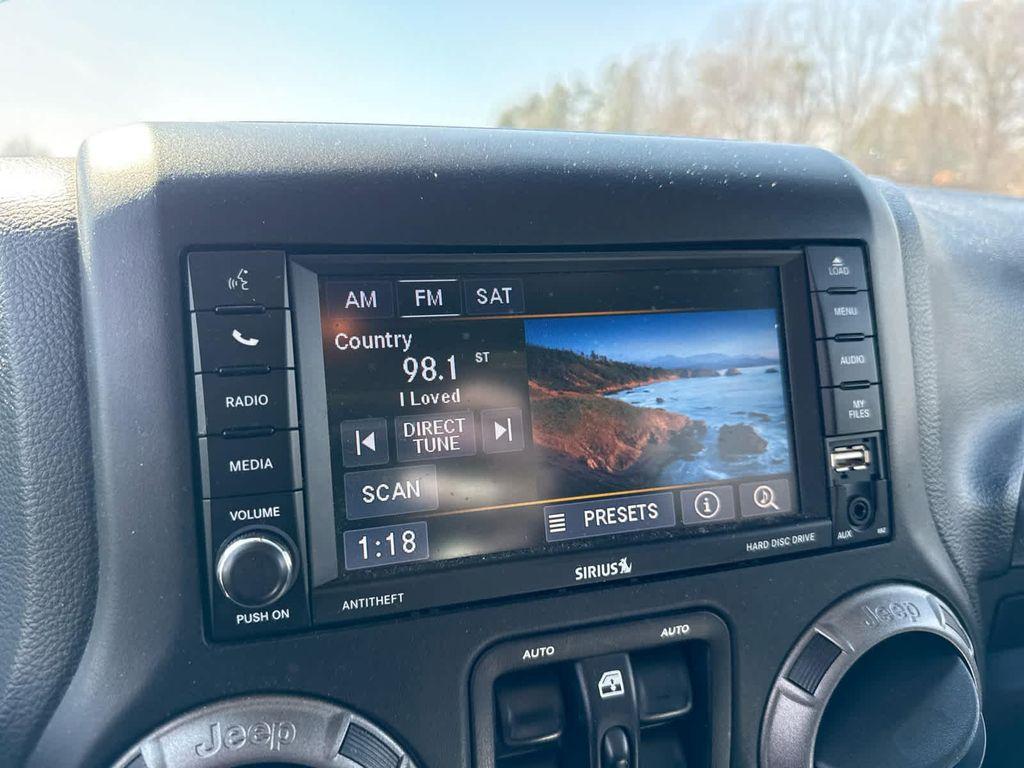 used 2018 Jeep Wrangler JK Unlimited car, priced at $19,699