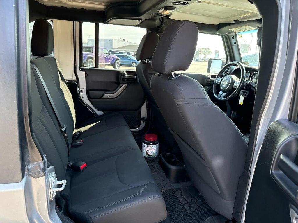 used 2018 Jeep Wrangler JK Unlimited car, priced at $19,699