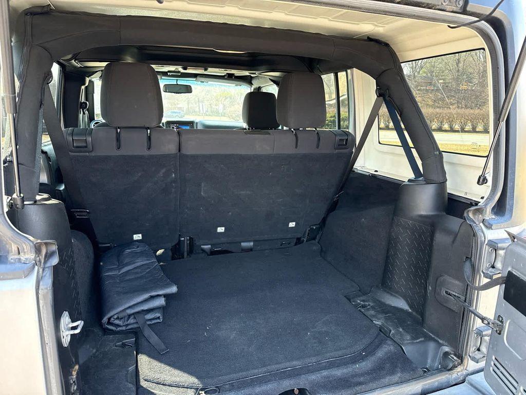 used 2018 Jeep Wrangler JK Unlimited car, priced at $19,699