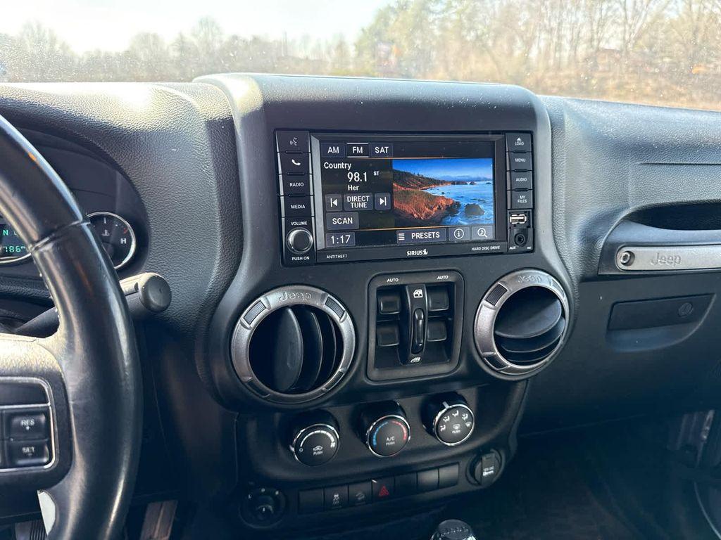 used 2018 Jeep Wrangler JK Unlimited car, priced at $19,699