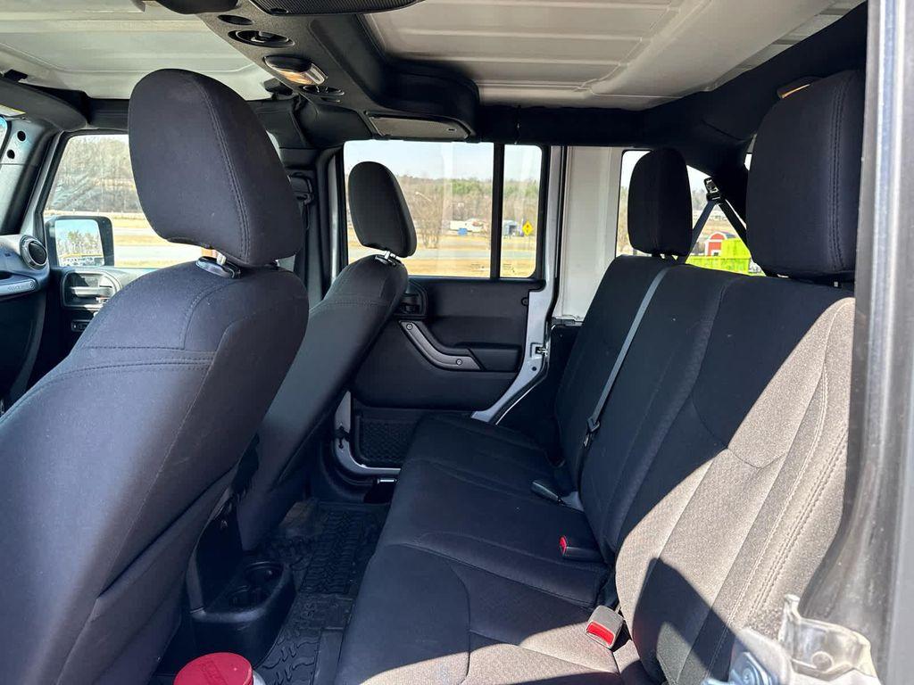 used 2018 Jeep Wrangler JK Unlimited car, priced at $19,699