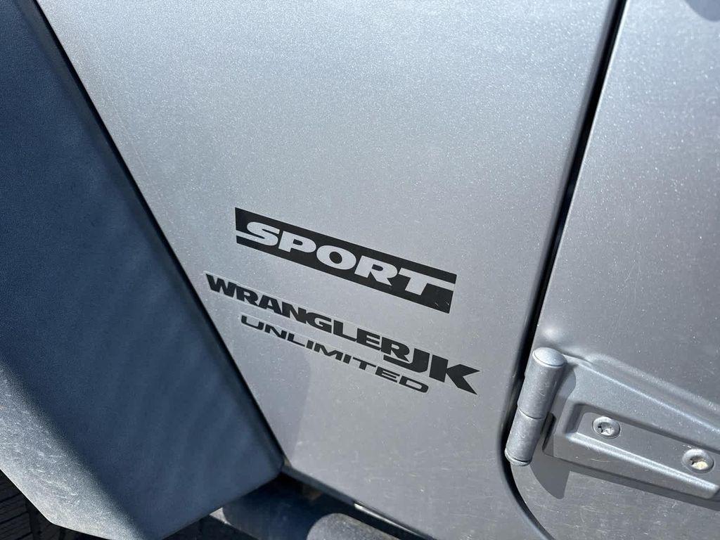 used 2018 Jeep Wrangler JK Unlimited car, priced at $19,699