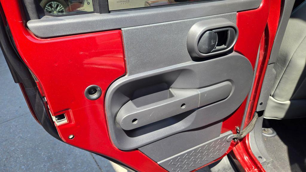 used 2010 Jeep Wrangler Unlimited car, priced at $16,990