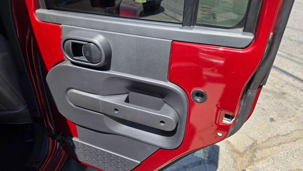 used 2010 Jeep Wrangler Unlimited car, priced at $16,990