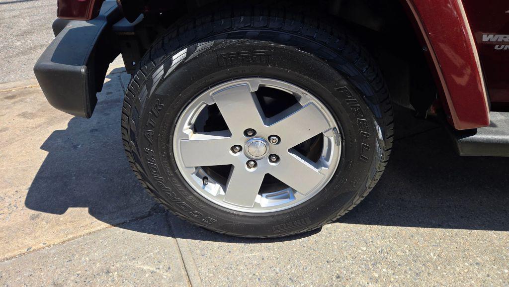 used 2010 Jeep Wrangler Unlimited car, priced at $16,990