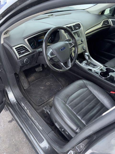 used 2016 Ford Fusion car, priced at $6,000