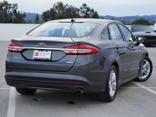 used 2018 Ford Fusion car, priced at $9,990