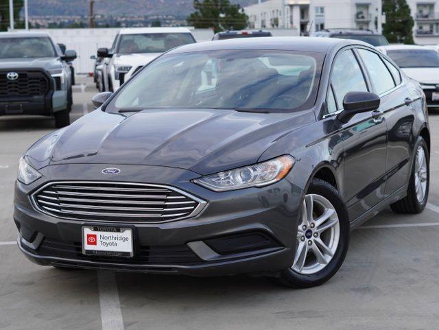 used 2018 Ford Fusion car, priced at $9,990