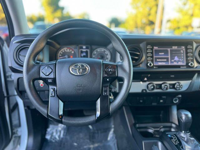 used 2023 Toyota Tacoma car, priced at $26,990