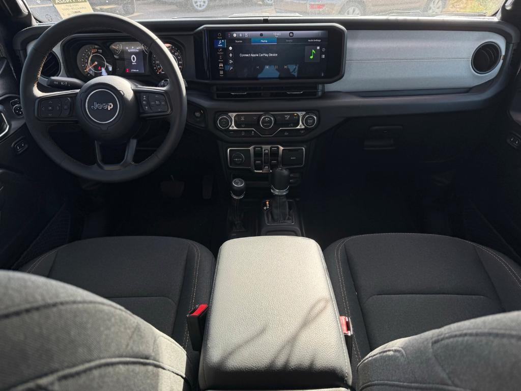 used 2024 Jeep Wrangler car, priced at $29,692