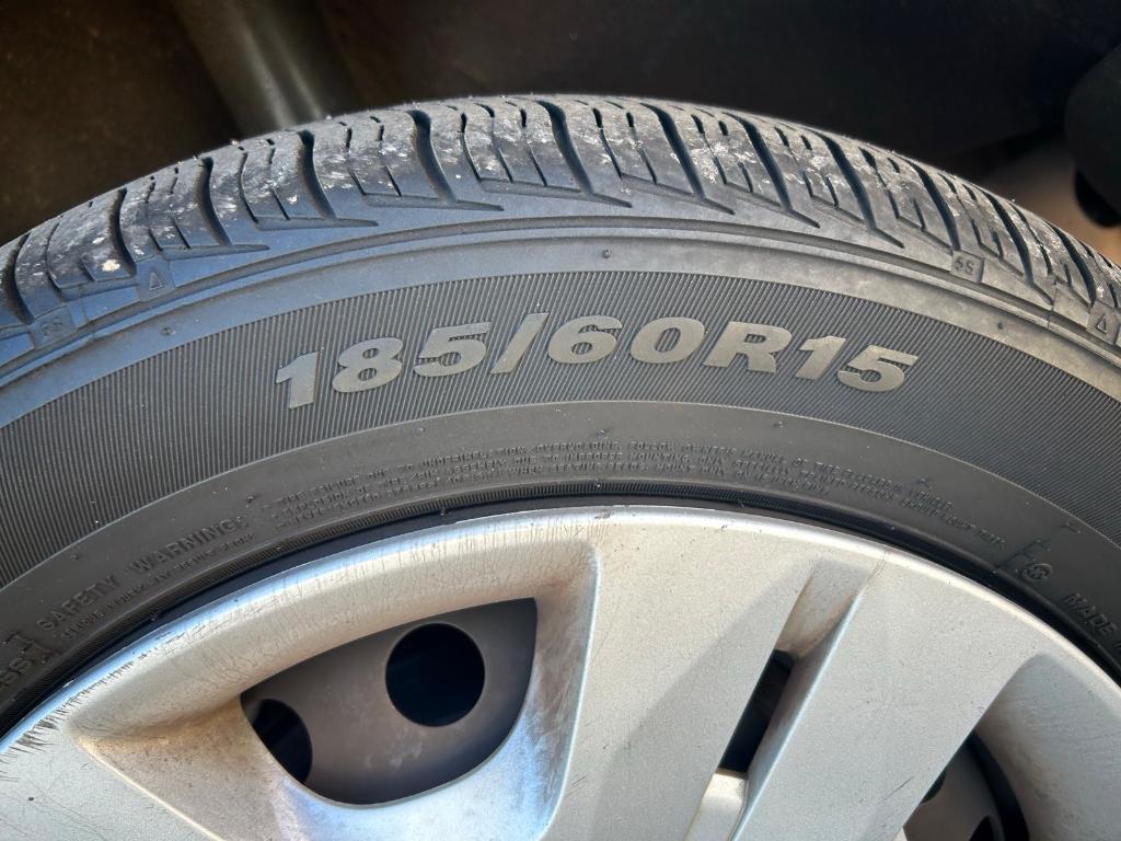 used 2010 Nissan Versa car, priced at $4,990