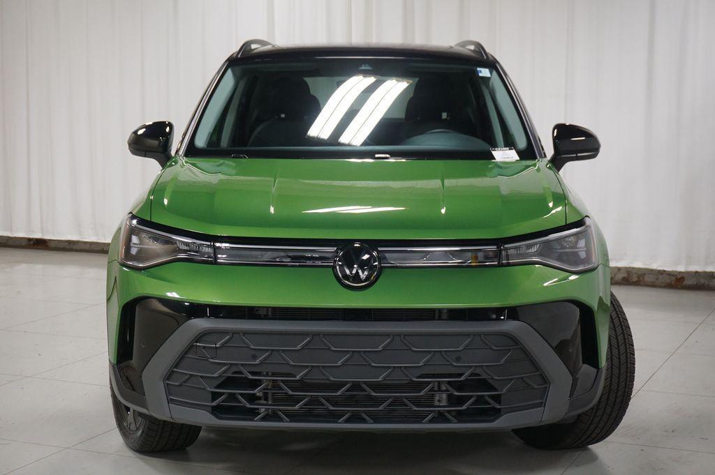 used 2025 Volkswagen Taos car, priced at $25,402