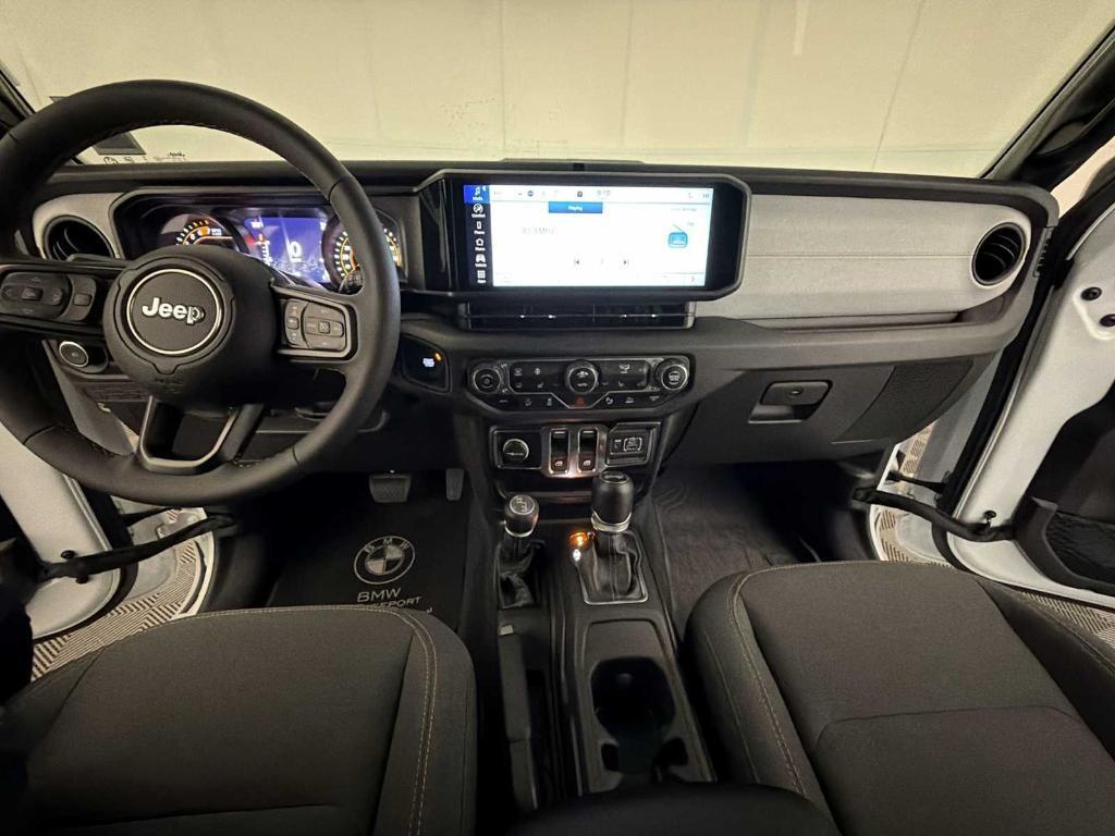 used 2024 Jeep Wrangler car, priced at $32,943