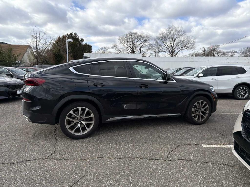 used 2023 BMW X6 car, priced at $53,943