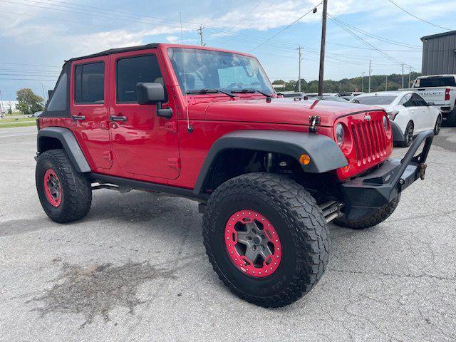 used 2011 Jeep Wrangler Unlimited car, priced at $15,995
