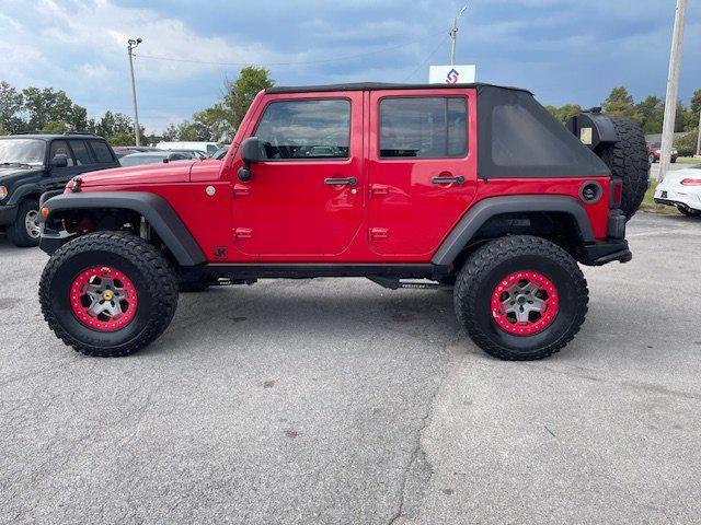 used 2011 Jeep Wrangler Unlimited car, priced at $15,995