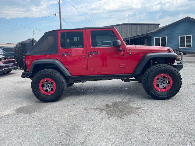 used 2011 Jeep Wrangler Unlimited car, priced at $15,995
