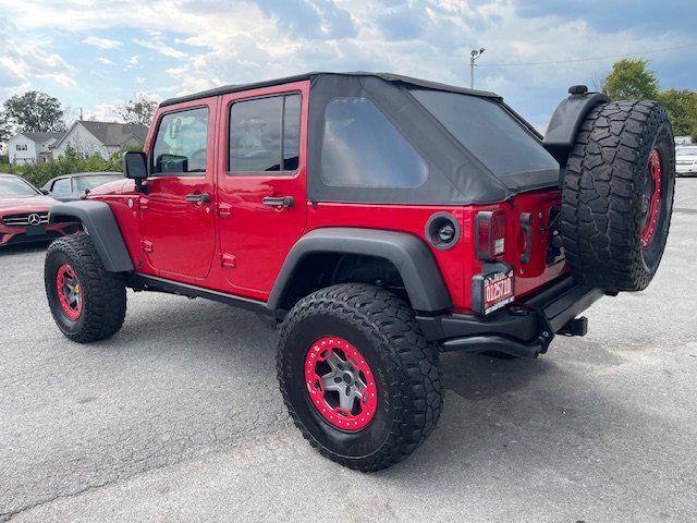used 2011 Jeep Wrangler Unlimited car, priced at $15,995