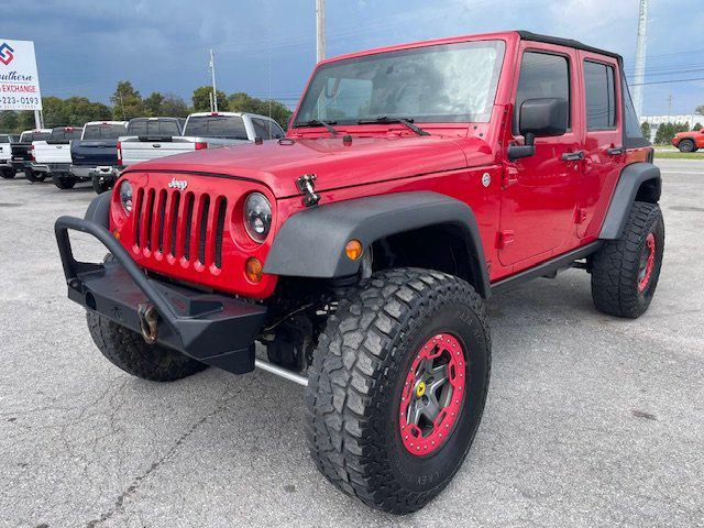 used 2011 Jeep Wrangler Unlimited car, priced at $16,995