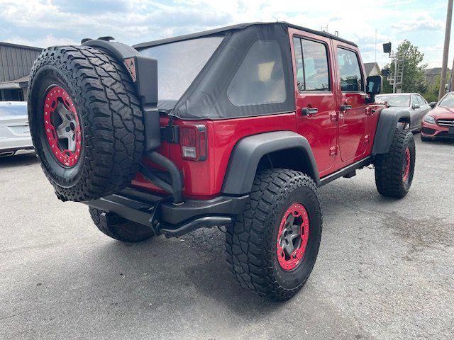 used 2011 Jeep Wrangler Unlimited car, priced at $15,995
