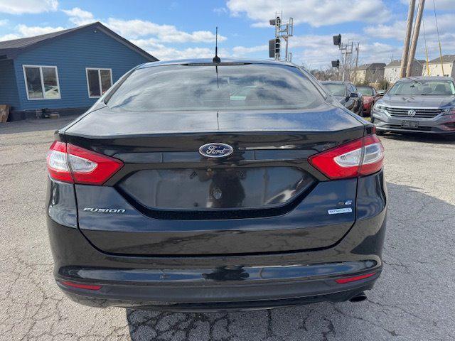 used 2013 Ford Fusion car, priced at $7,995