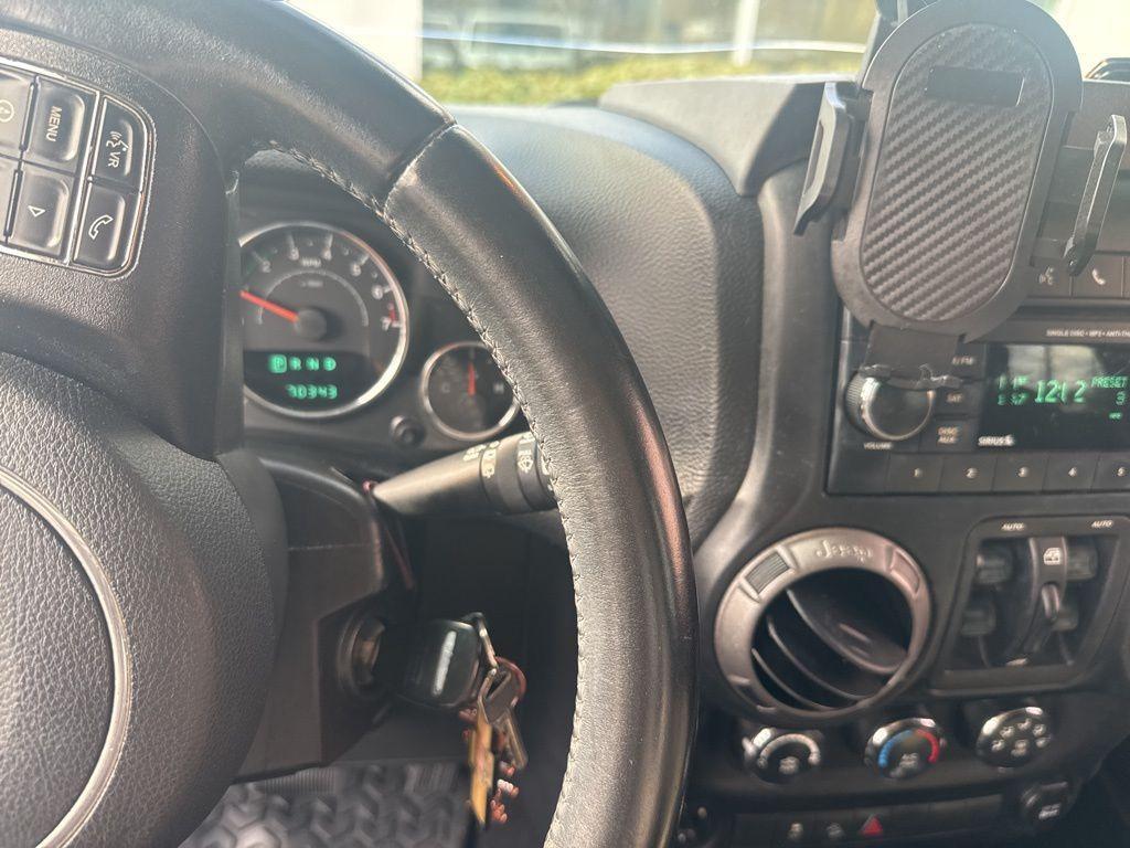 used 2013 Jeep Wrangler Unlimited car, priced at $14,616