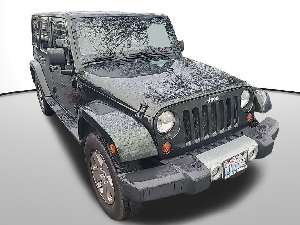 used 2011 Jeep Wrangler Unlimited car, priced at $12,600