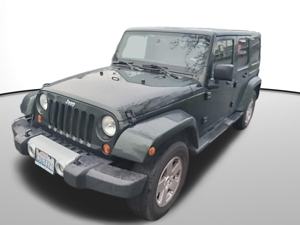 used 2011 Jeep Wrangler Unlimited car, priced at $12,600