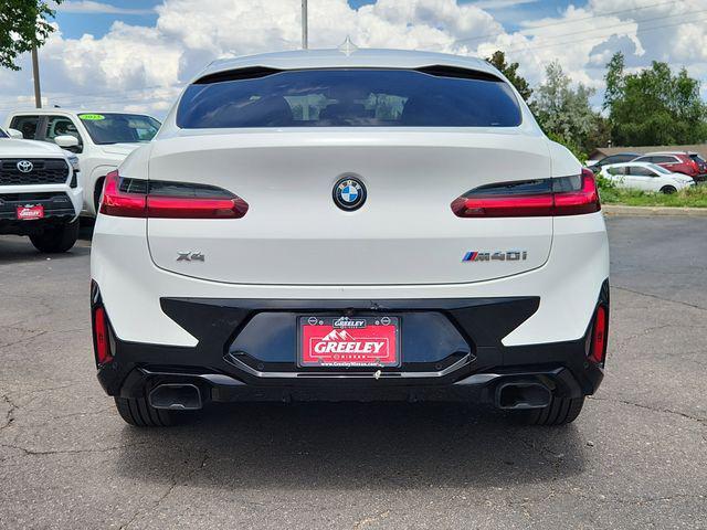 used 2025 BMW X4 car, priced at $63,999