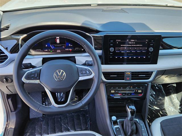new 2025 Volkswagen Taos car, priced at $30,063
