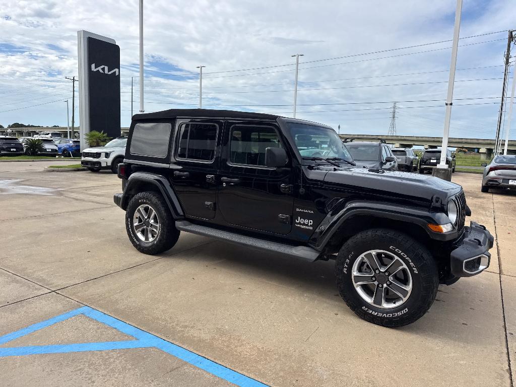 used 2021 Jeep Wrangler Unlimited car, priced at $27,357