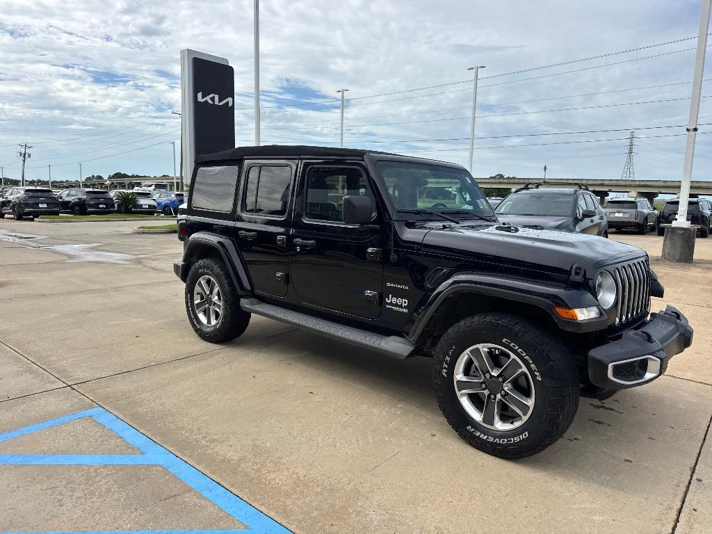 used 2021 Jeep Wrangler Unlimited car, priced at $27,357