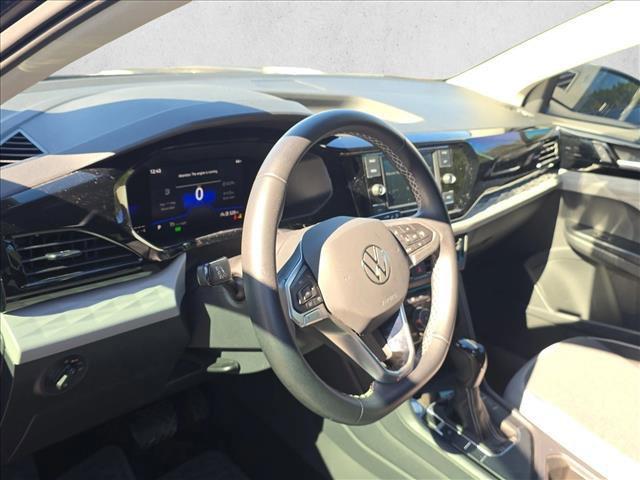used 2023 Volkswagen Taos car, priced at $17,888