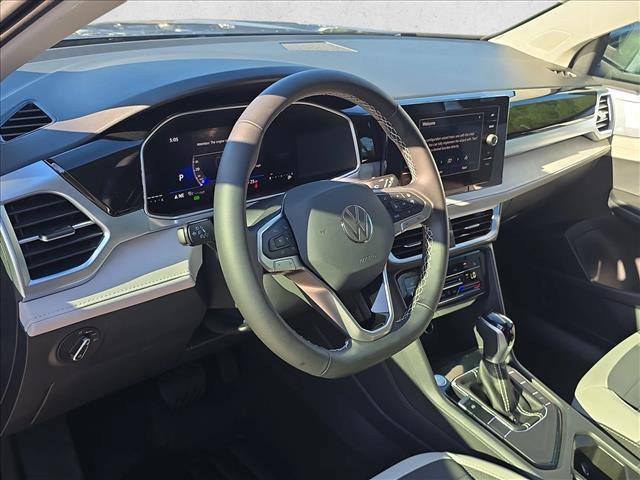 new 2025 Volkswagen Taos car, priced at $27,657