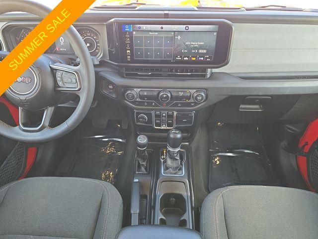 used 2024 Jeep Wrangler car, priced at $27,592