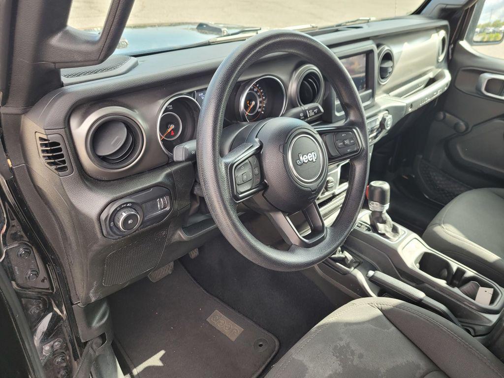 used 2023 Jeep Wrangler car, priced at $28,357