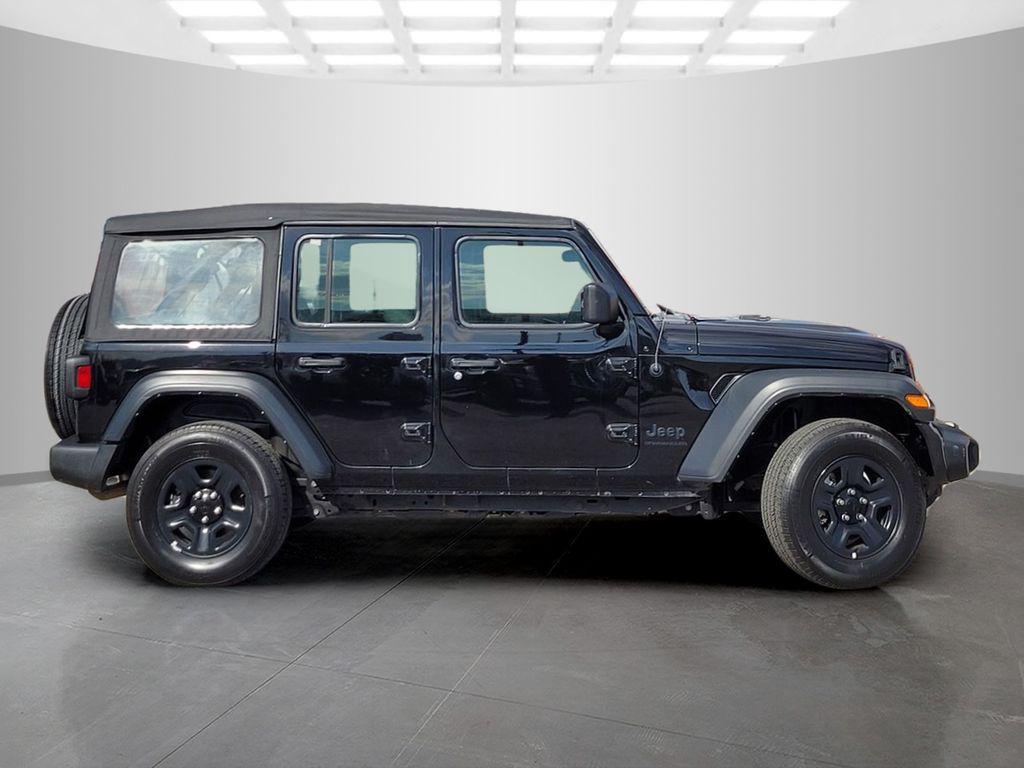 used 2023 Jeep Wrangler car, priced at $28,357