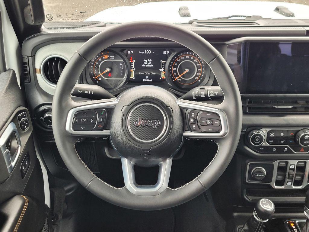 used 2025 Jeep Wrangler car, priced at $33,800