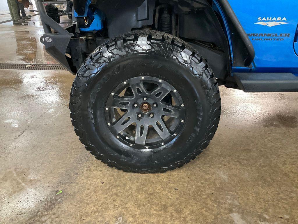 used 2014 Jeep Wrangler Unlimited car, priced at $10,711