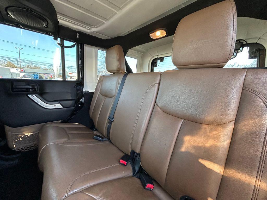 used 2013 Jeep Wrangler Unlimited car, priced at $13,995